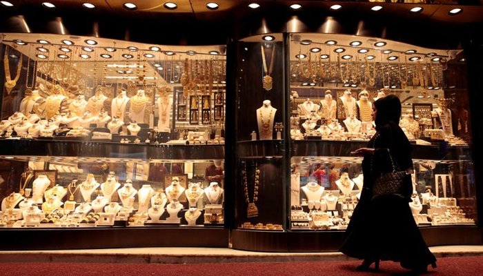 A customer can be seen outside a gold shop